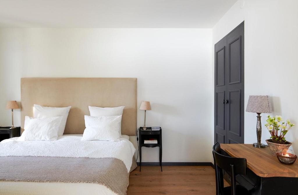 Postel nebo postele na pokoji v ubytování Maison d'hôtes Ermitage