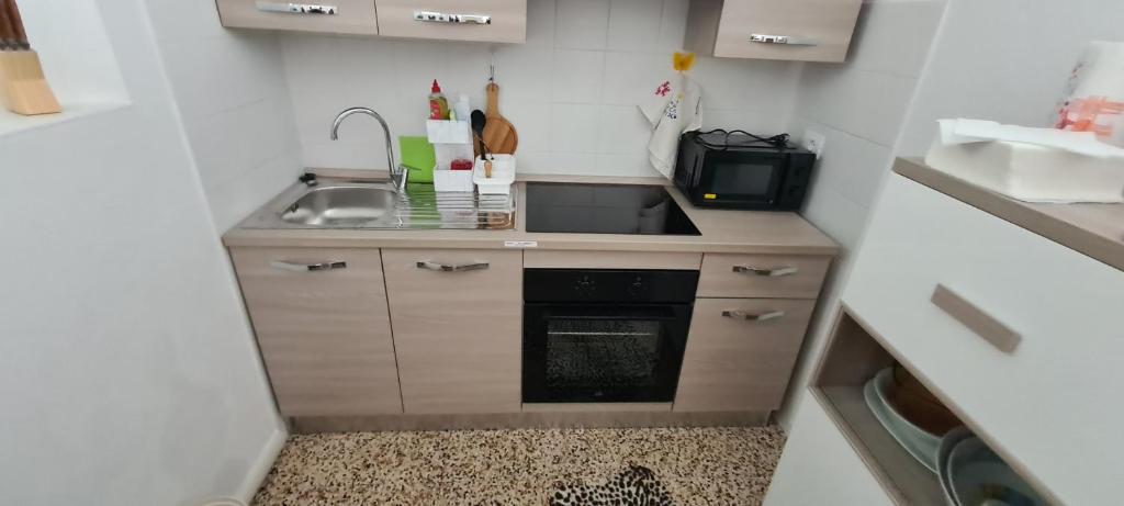 Kuchyň nebo kuchyňský kout v ubytování Da Ersilia
