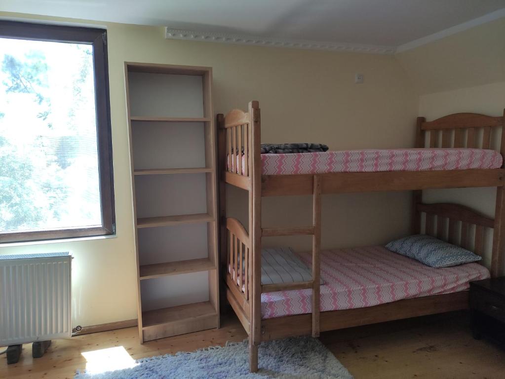 Postel nebo postele na pokoji v ubytování Valdi Guest Shekvetili