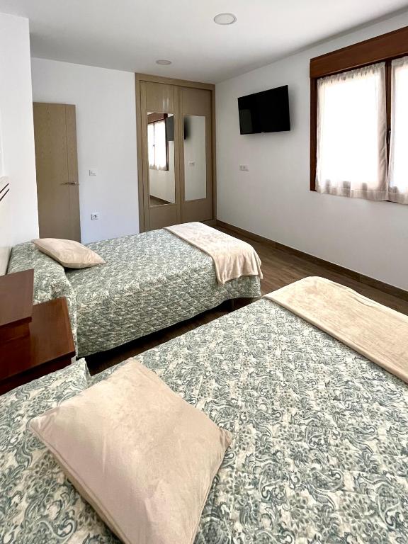 Postel nebo postele na pokoji v ubytování Apartamento Valbuena
