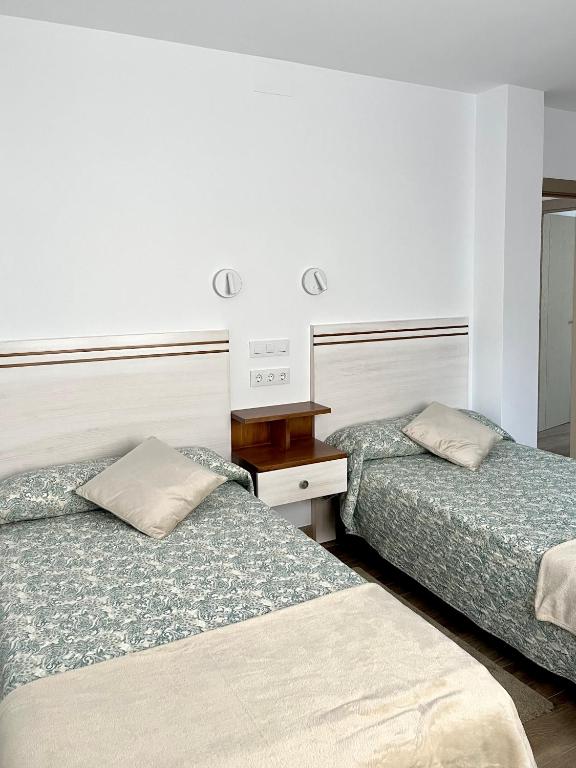 Postel nebo postele na pokoji v ubytování Apartamento Valbuena