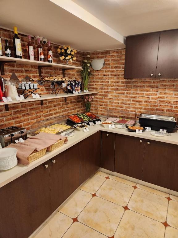 Kuchyň nebo kuchyňský kout v ubytování Elizeu Hotel