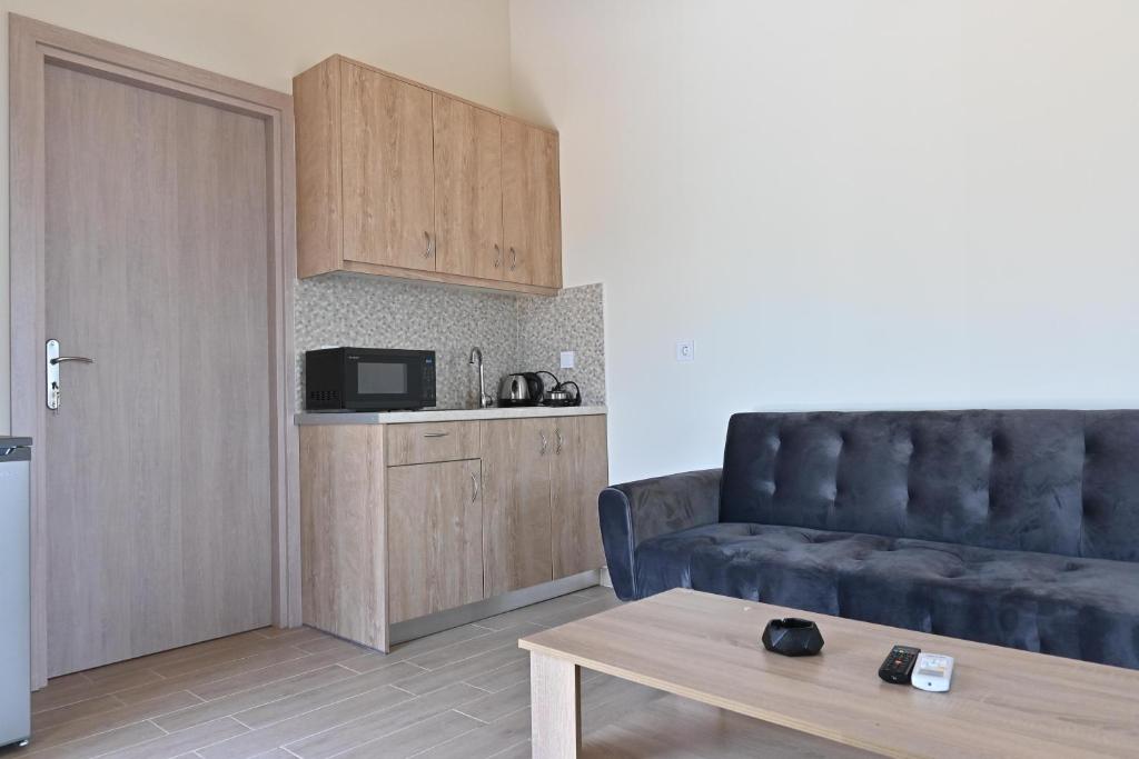 Kuchyň nebo kuchyňský kout v ubytování Lithino Rooms Kalamata