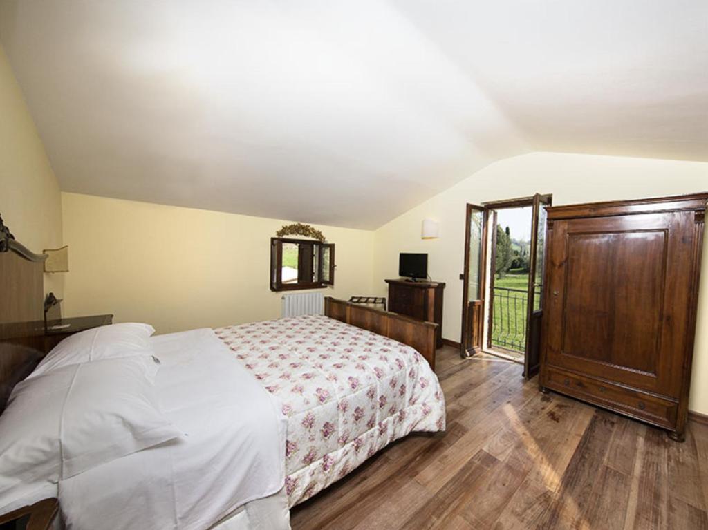 Postel nebo postele na pokoji v ubytování Le Case Resort