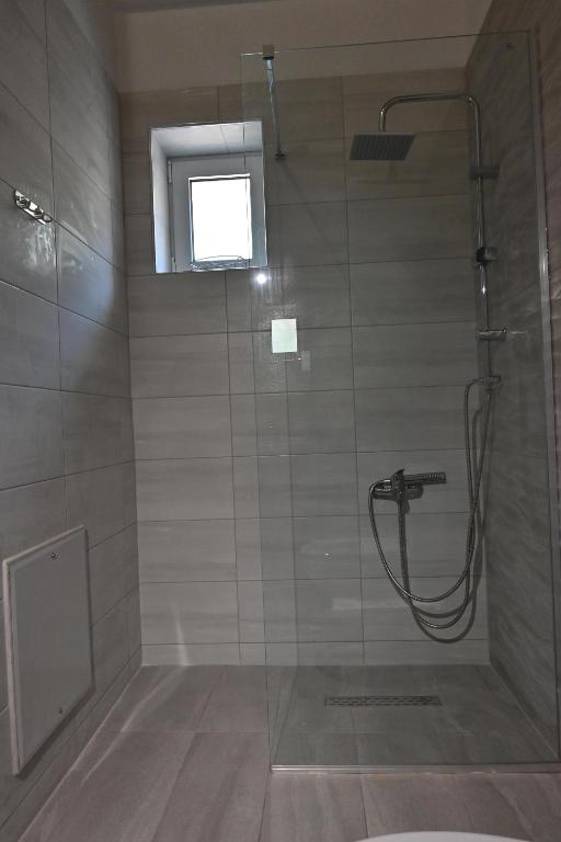Koupelna v ubytování Lithino Rooms Kalamata