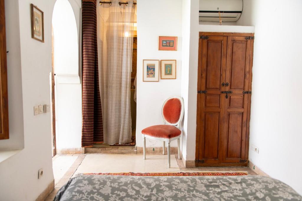 Postel nebo postele na pokoji v ubytování Riad Ben Youssef