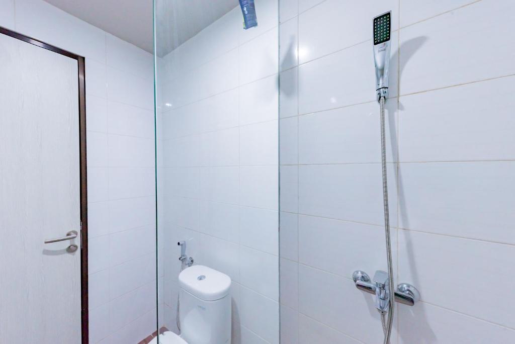 Koupelna v ubytování Sans Hotel Berau Square