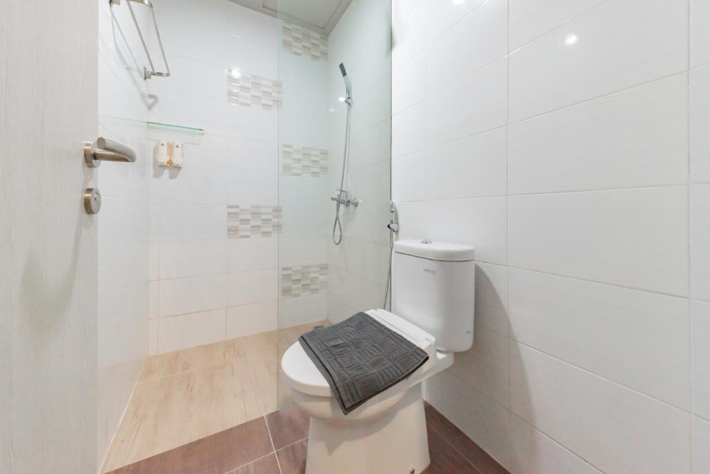Koupelna v ubytování Sans Hotel Berau Square