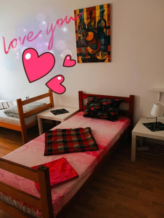 Postel nebo postele na pokoji v ubytování Jasmin