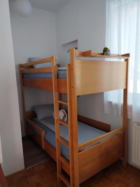 Postel nebo postele na pokoji v ubytování Apartment Stella