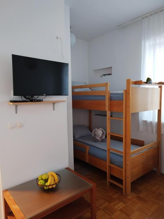 Postel nebo postele na pokoji v ubytování Apartment Stella