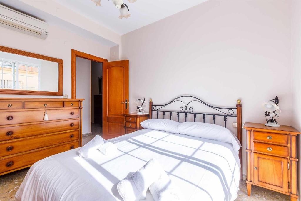 Łóżko lub łóżka w pokoju w obiekcie A&N Casa del Sol