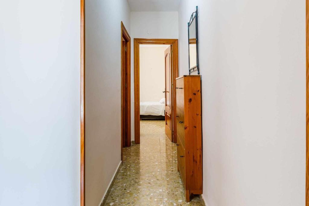 Łóżko lub łóżka w pokoju w obiekcie A&N Casa del Sol