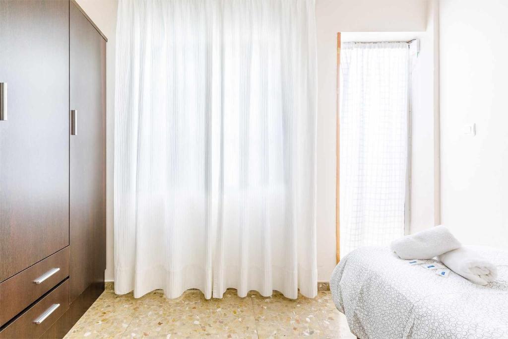 Łóżko lub łóżka w pokoju w obiekcie A&N Casa del Sol