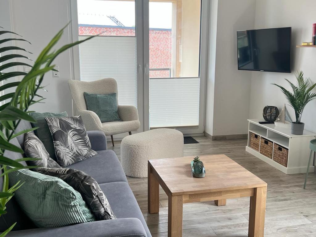TV a/nebo společenská místnost v ubytování Pearl 7 Nordsee Park Dangast