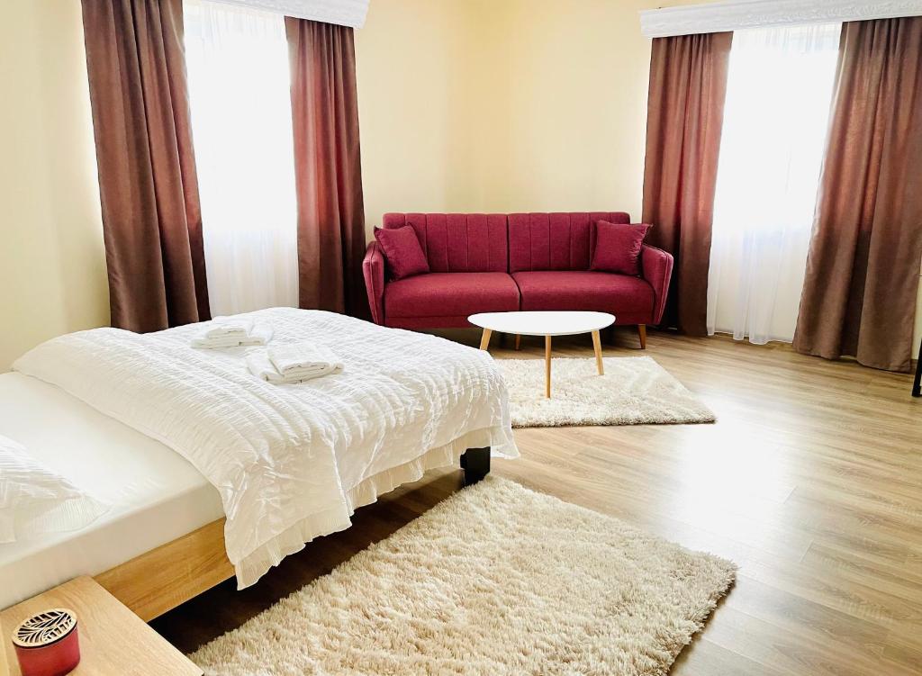 Postel nebo postele na pokoji v ubytování Casa Maria Platoul Luncanilor