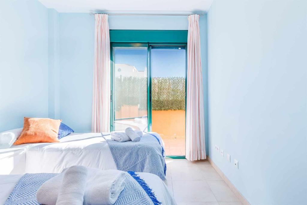 Posteľ alebo postele v izbe v ubytovaní A&N El Señorio 2, Torre del Mar