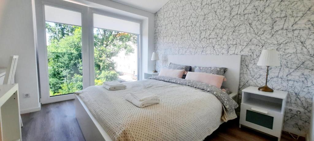 Ένα ή περισσότερα κρεβάτια σε δωμάτιο στο Fortress Stay