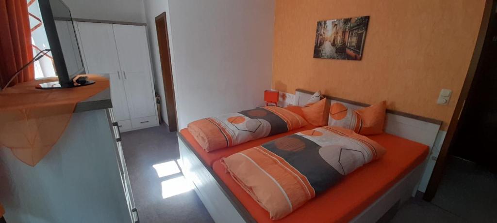 Postel nebo postele na pokoji v ubytování Pension Waldidyll