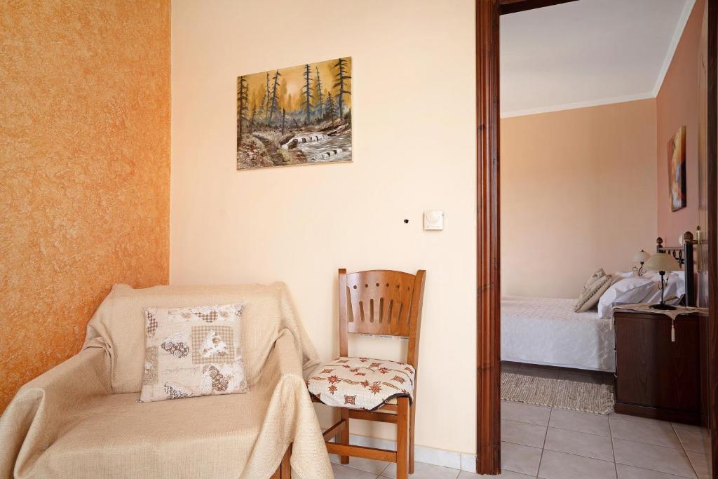 Postel nebo postele na pokoji v ubytování Lakis Apartment
