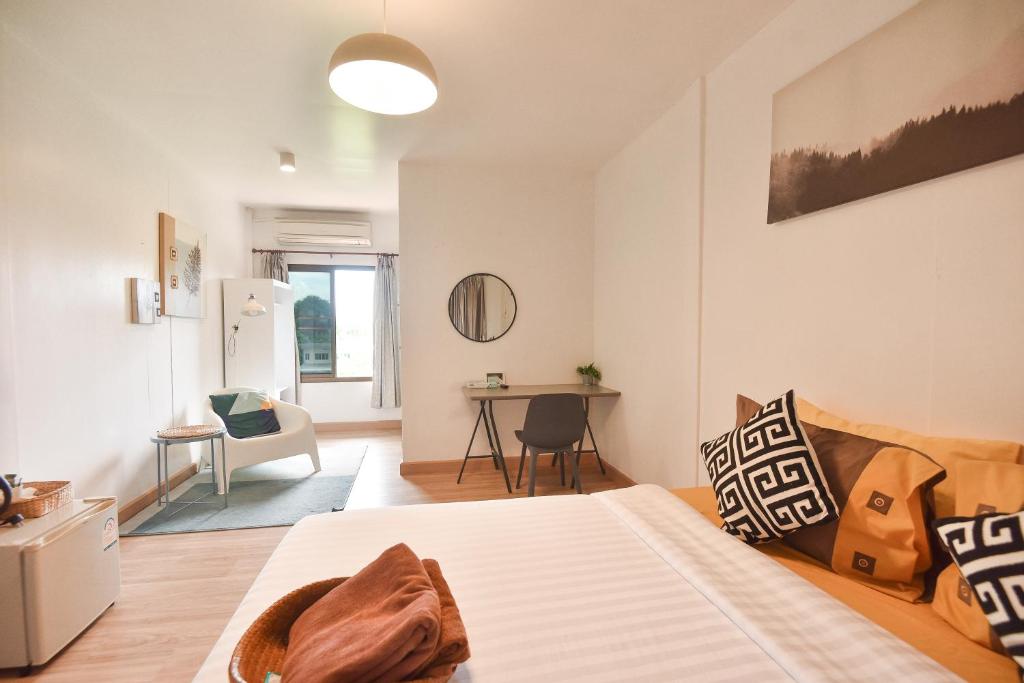 Postel nebo postele na pokoji v ubytování P.U. Inn Resort