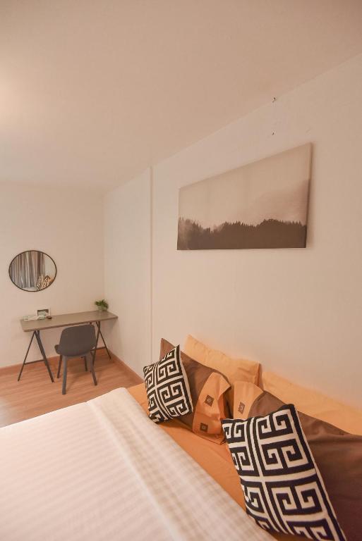 Postel nebo postele na pokoji v ubytování P.U. Inn Resort