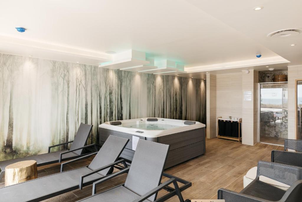Posezení v ubytování Hôtel Édenia - Spa Estime&Sens