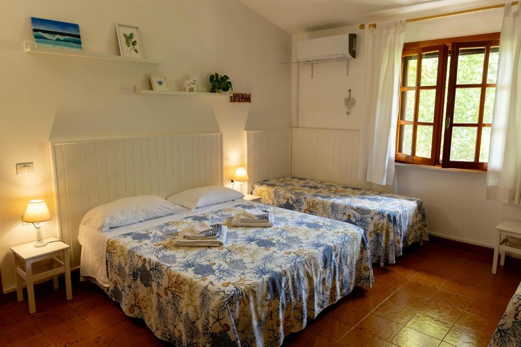 Postel nebo postele na pokoji v ubytování B&B Cavalieri