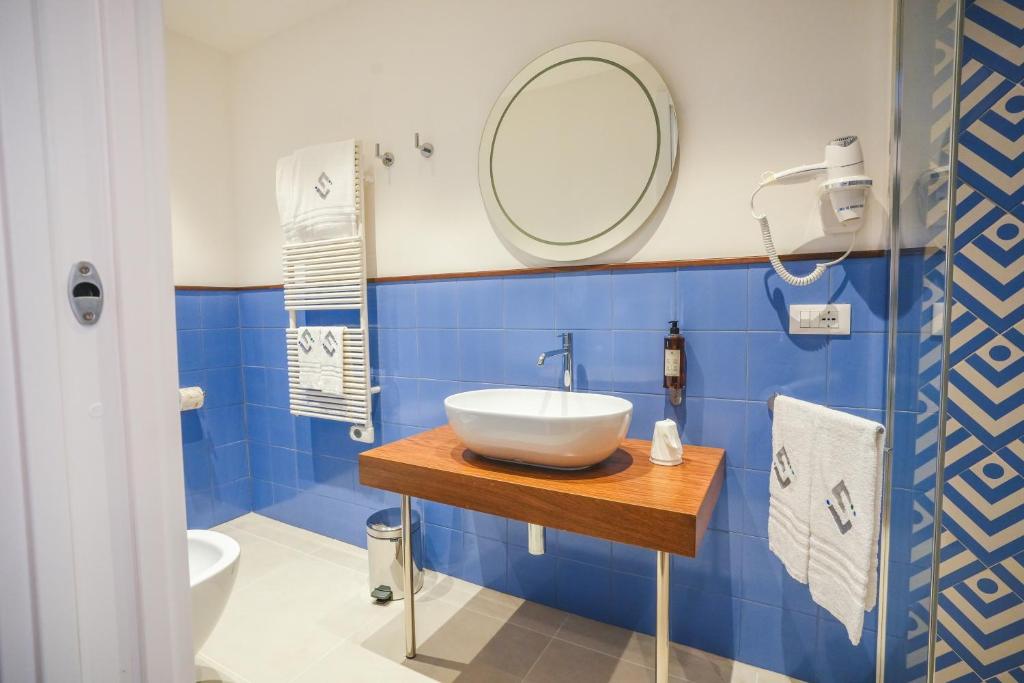 Koupelna v ubytování Cafè Latino Suites