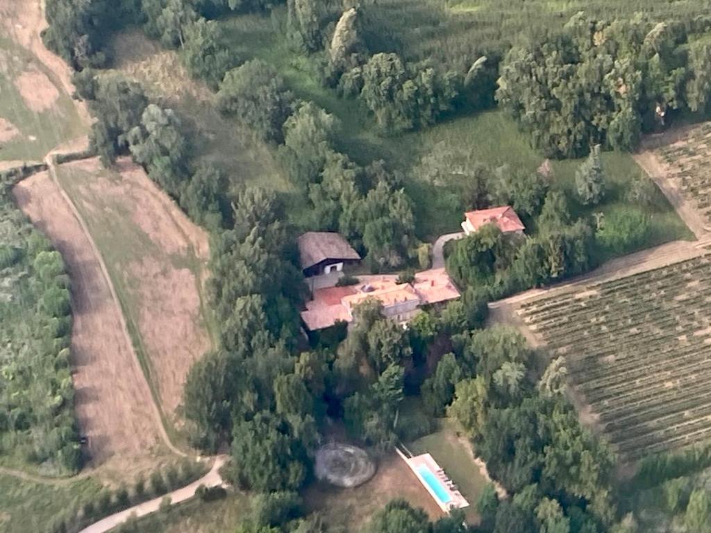 an aerial view of a house in a field at FABULEUX - Domaine du Moulin D'Andraut Bordeaux-Chevaux-Golf-St Emilion in Montussan