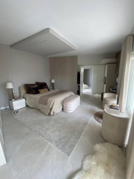 Postel nebo postele na pokoji v ubytování Villa design vue panoramique