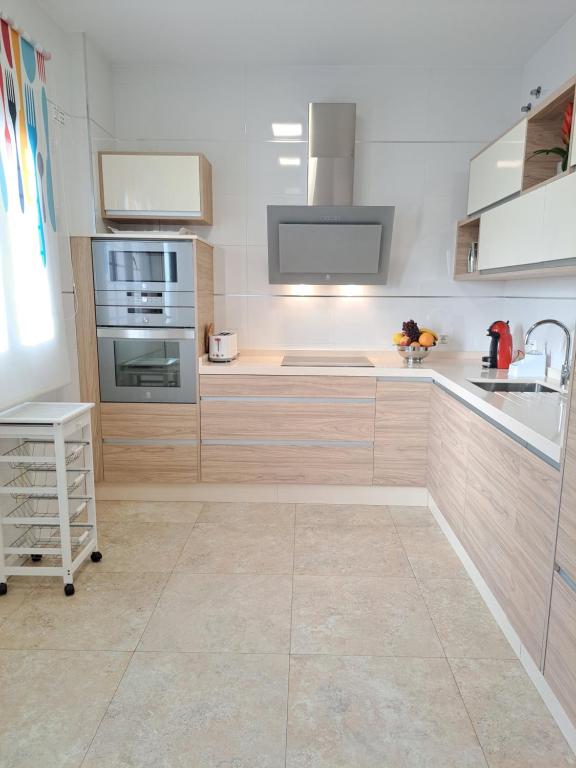 Kuchyňa alebo kuchynka v ubytovaní Villa Las Tres J