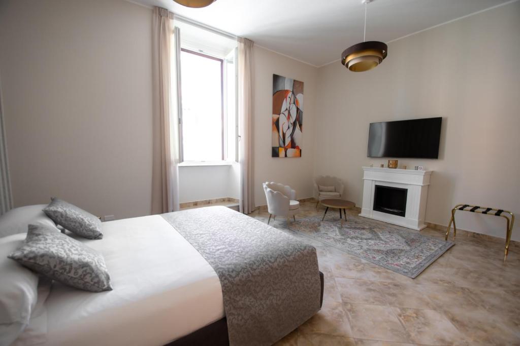 Postel nebo postele na pokoji v ubytování Lifestyle and Suites