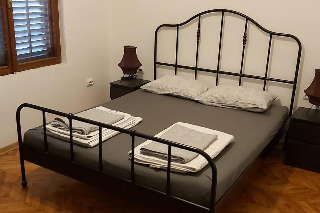 Postel nebo postele na pokoji v ubytování Villa Hedonic
