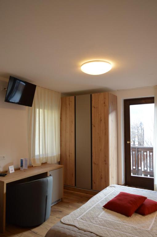 Postel nebo postele na pokoji v ubytování Hotel Wanda