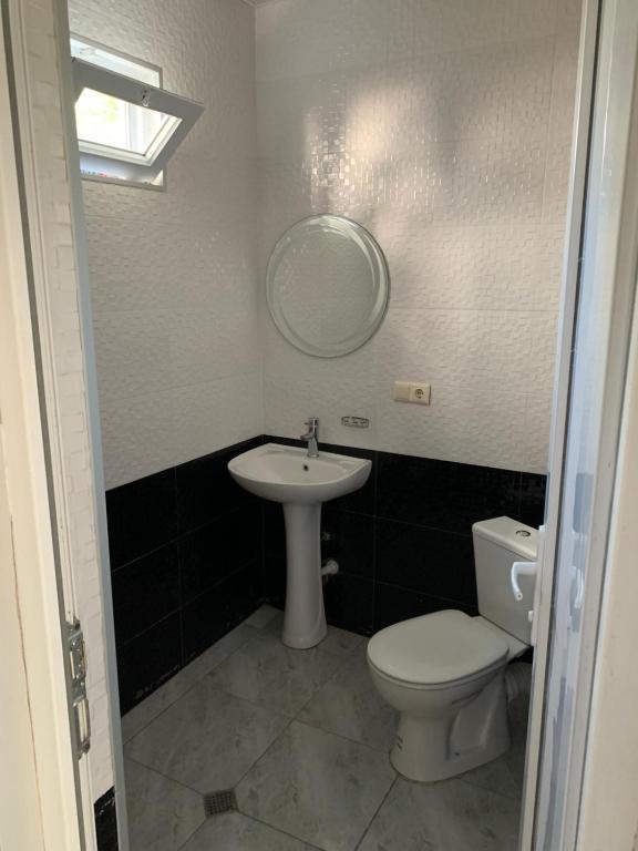 Koupelna v ubytování KARD HOUSE