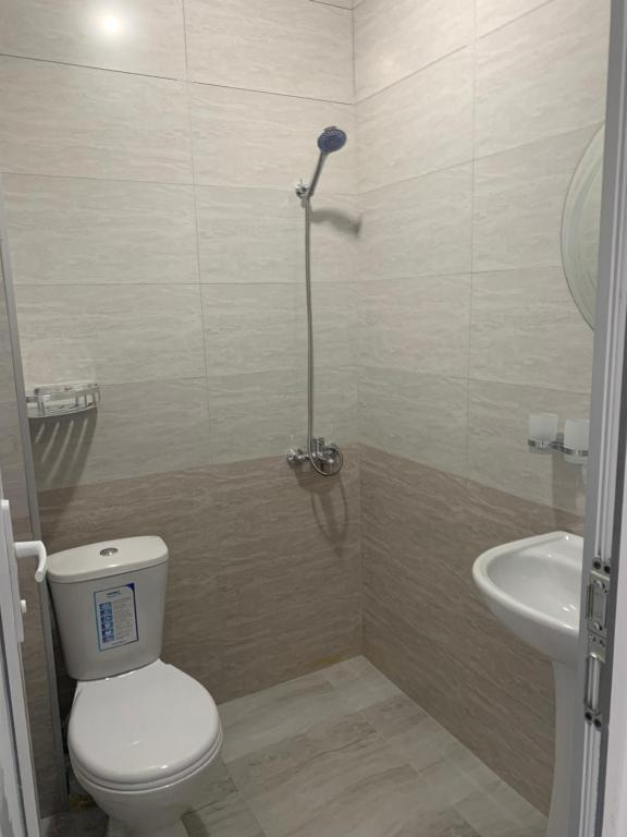 Koupelna v ubytování KARD HOUSE
