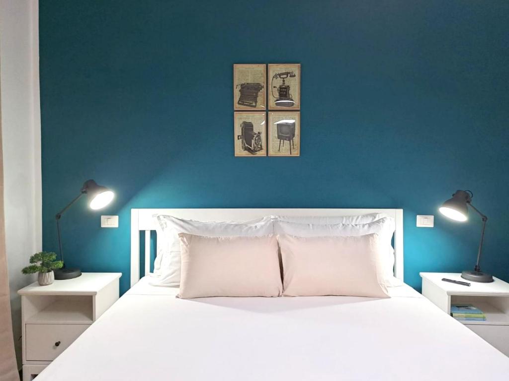 Posteľ alebo postele v izbe v ubytovaní Ajana Rooms by Accomodo