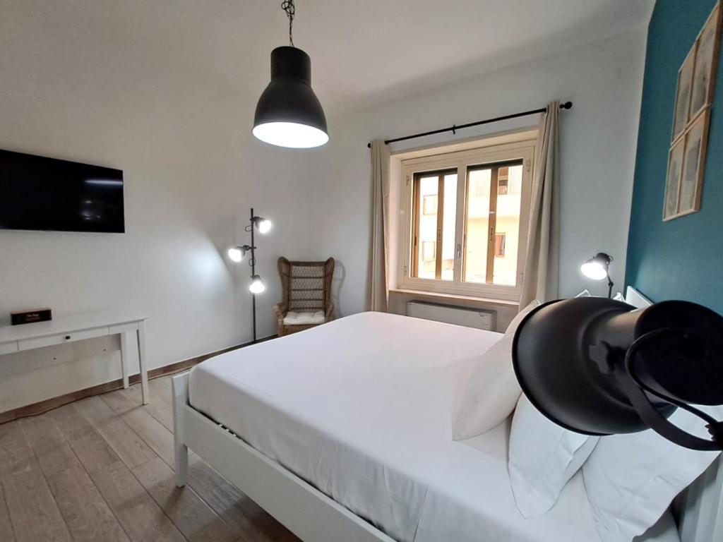 Posteľ alebo postele v izbe v ubytovaní Ajana Rooms by Accomodo