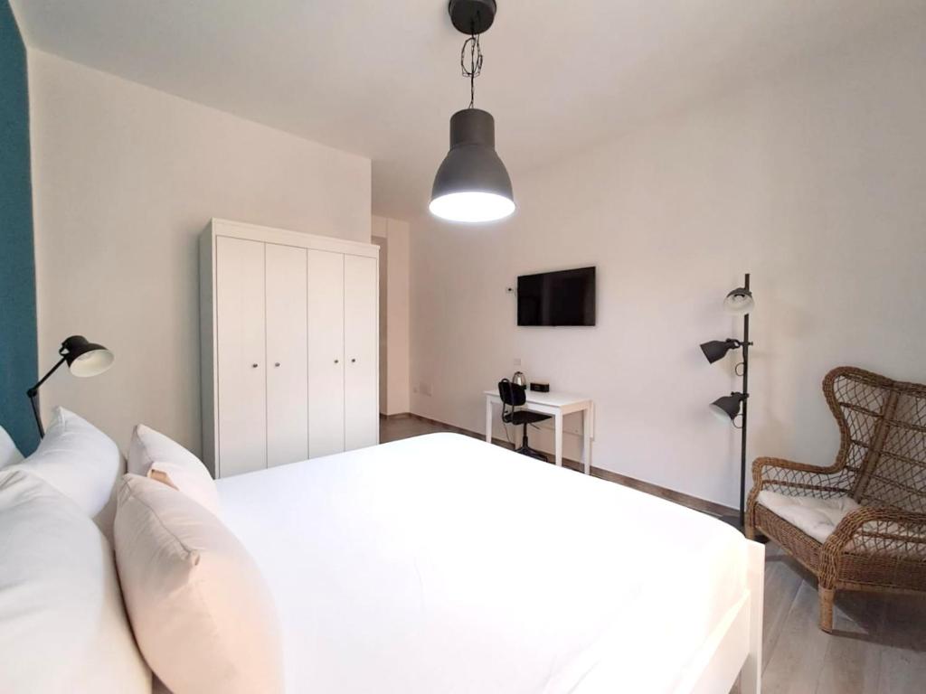Posteľ alebo postele v izbe v ubytovaní Ajana Rooms by Accomodo