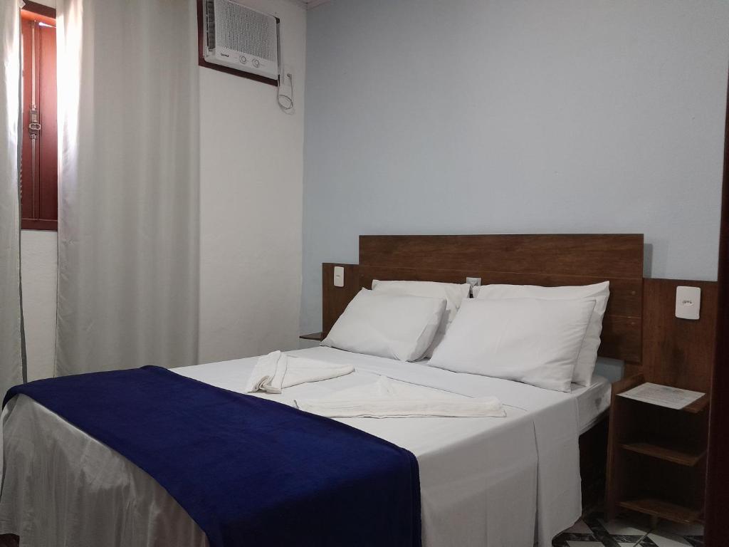 Postel nebo postele na pokoji v ubytování Casa de Temporada Ceu e Mar