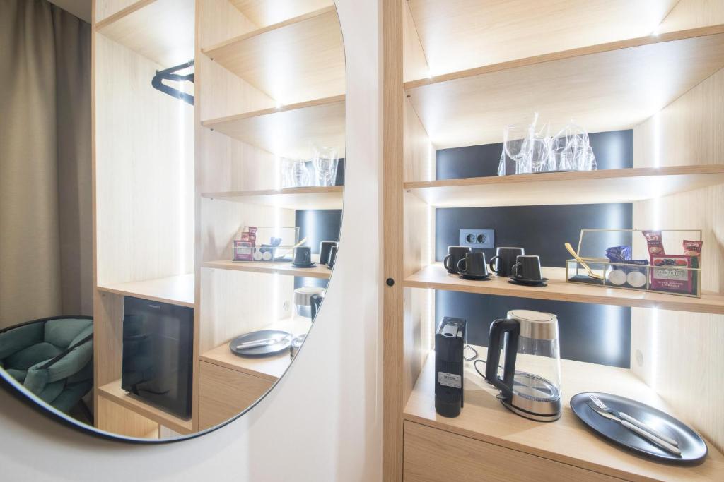 Kuchyň nebo kuchyňský kout v ubytování Tonio Rooms