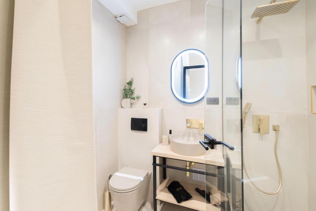 Koupelna v ubytování Tonio Rooms