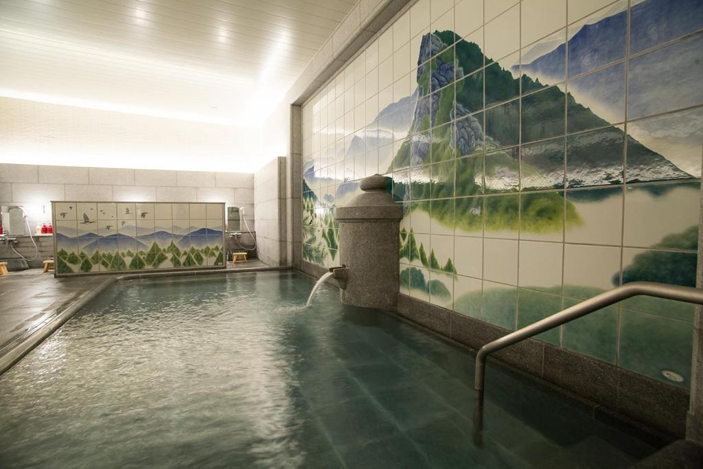 Bazén v ubytování GUEST HOUSE DOUGOYADO KITA nebo v jeho okolí
