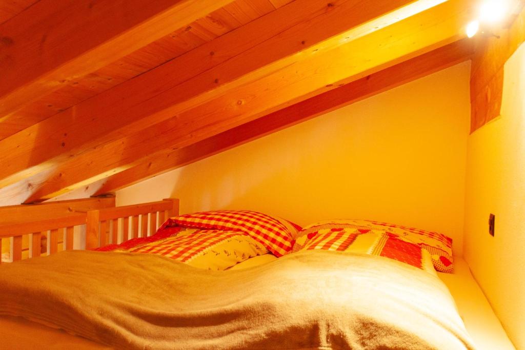Postel nebo postele na pokoji v ubytování Hotel Madrisajoch
