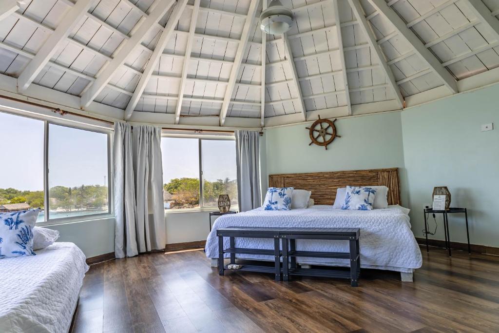 Voodi või voodid majutusasutuse Fragata Island House toas