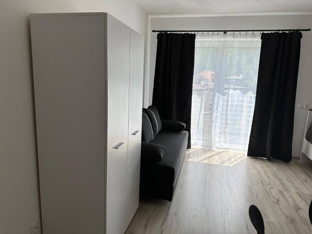 Posezení v ubytování Roomflacja