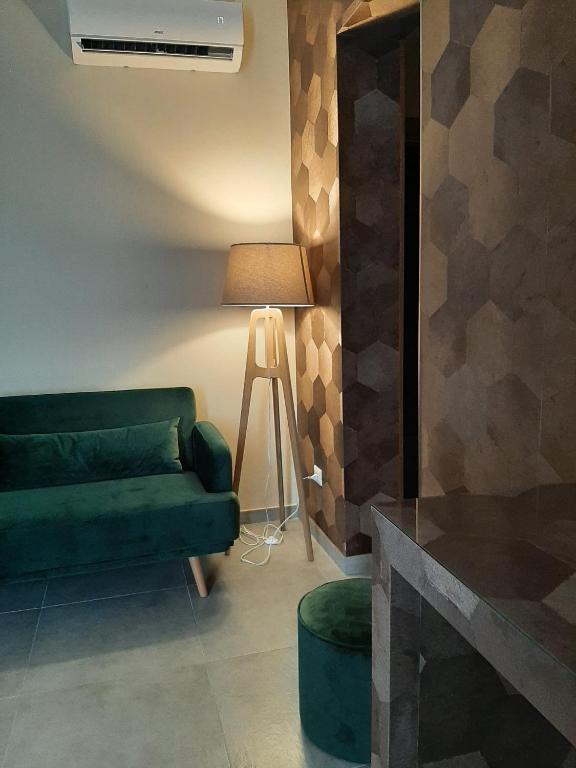 Area soggiorno di BAARIA House Hotel