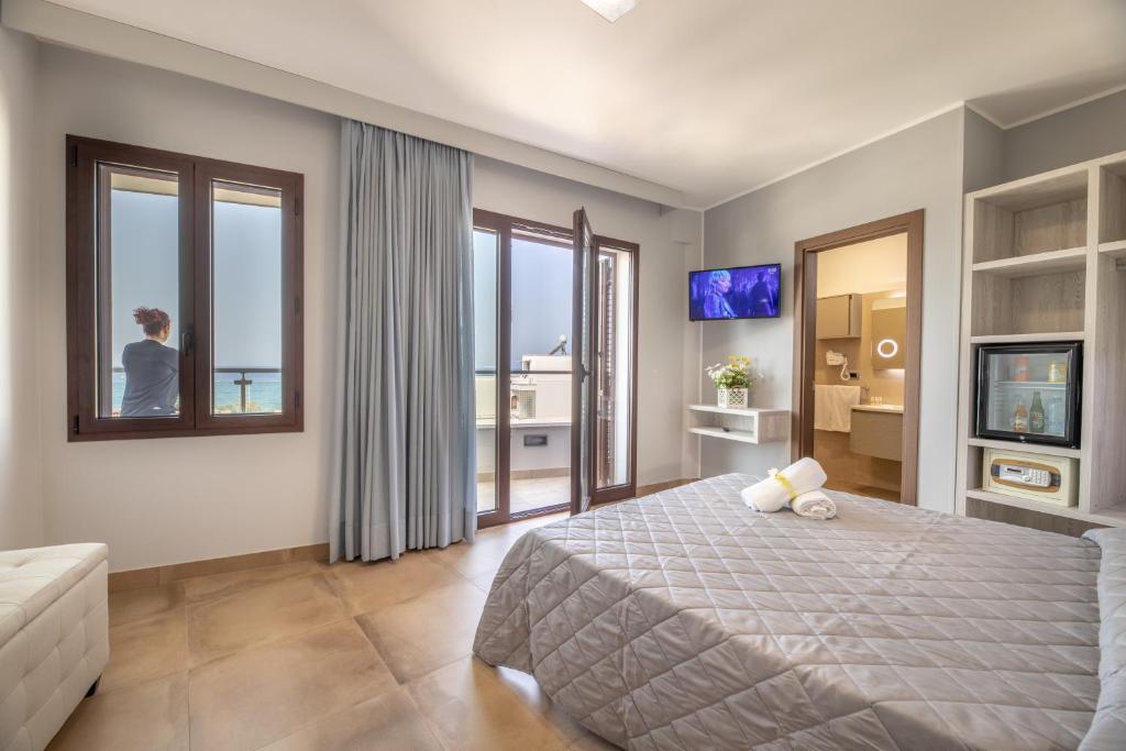 Postel nebo postele na pokoji v ubytování Hotel Salento Mirfran