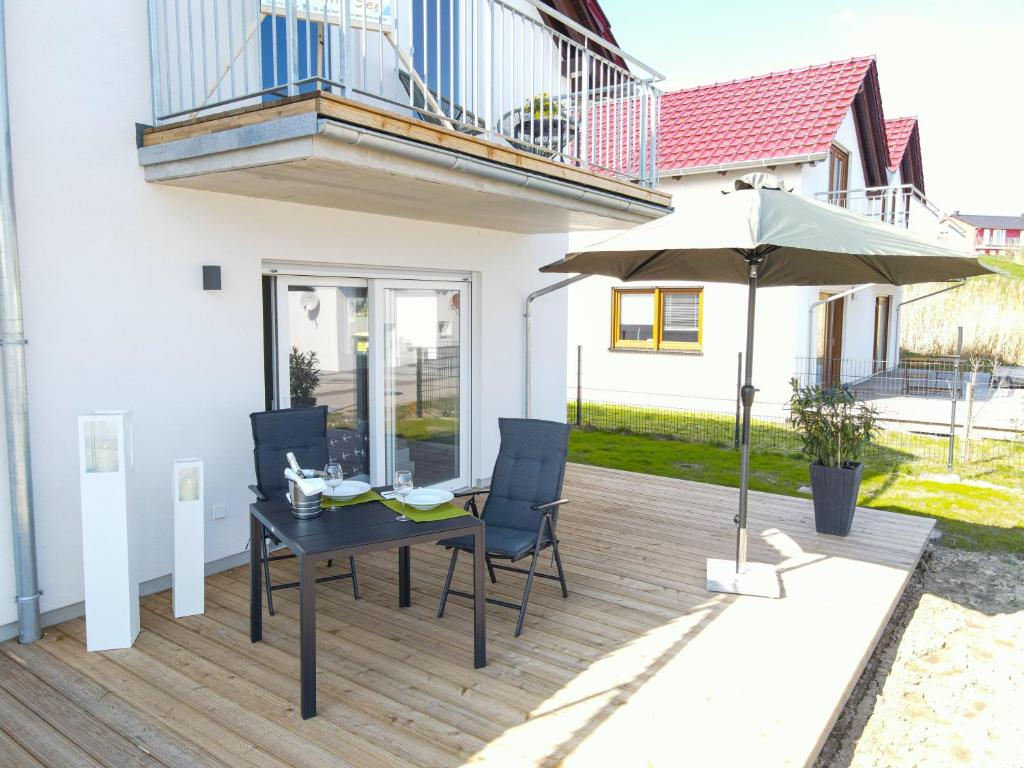 Balkón nebo terasa v ubytování Geiseltalsee Haus am See mit Wallbox